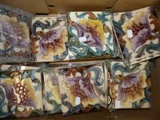 A COLLECTION OF ART NOUVEAU STYLE FLORAL DECORATED TILES