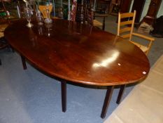 A LARGE GEO.III.MAHOGANY WAKE TABLE WITH DROP LEAVES RAISED ON EIGHT SQUARE TAPER LEGS. L.242 x W.