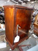 AN ANTIQUE GEORGIAN MAHOGANY SPICE CUPBOARD WITH MULTI DRAWER INTERIOR. H.20cms. W.20cms.