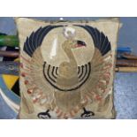 AN ANTIQUE EGYPTIAN TEXTILE DEPICTING NEKHBET. NOW MOUNTED AS A CUSHION COVER. TOGETHER WITH TWO