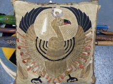 AN ANTIQUE EGYPTIAN TEXTILE DEPICTING NEKHBET. NOW MOUNTED AS A CUSHION COVER. TOGETHER WITH TWO