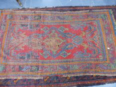 AN ANTIQUE BELOUCH RUG. 225 x 117cms AND A SMALL TURKEY RUG.