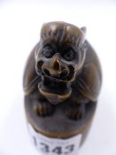 A HEAVY CHINESE BRONZE SEAL SURMOUNTED BY A MYTHICAL BEAST. H.7cms.