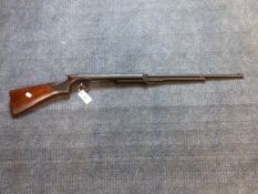 A BSA UNDER LEVER AIR RIFLE IN .22 CALIBRE, SERIAL No.546893.