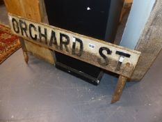 A CAST IRON ROAD SIGN, ORCHARD STREET.