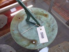 TWO ANTIQUE BRONZE SUNDIALS AND TWO LATER EXAMPLES. LARGEST Dia.23cms.