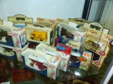 A QTY OF LLEDO, MATCHBOX AND OTHER BOXED DIE CAST VEHICLES.