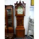 A VICTORIAN OAK AND MAHOGANY CASED 8-DAY LONG CASE CLOCK WITH 13" PAINTED ARCH TOP DIAL, SIGNED Wm.