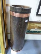 A COLONIAL PALM WOOD CYLINDER FORM STICKSTAND WITH COPPER BANDING. H.77cms.