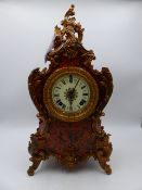 A LATE 19th.C.FRENCH STYLE FAUX TORTOISESHELL BOULLE WORK MANTLE CLOCK WITH ROCOCO METAL FITTINGS.