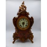 A LATE 19th.C.FRENCH STYLE FAUX TORTOISESHELL BOULLE WORK MANTLE CLOCK WITH ROCOCO METAL FITTINGS.