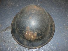 EIGHT WORN BRITISH WWII HELMETS TO INCLUDE TWO NFS AND ONE WARDEN.