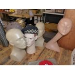 A GROUP OF SEVEN VINTAGE SHOP DISPLAY HEAD MANNEQUINS.