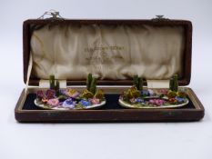 A DERBY PORCELAIN BOXED PAIR OF MENU HOLDERS.