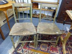 A PAIR OF REGENCY PAINTED RUSH SEAT CHAIRS.