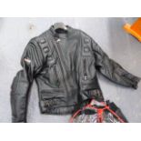 A TWO PIECE SET OF MOTORCYCLE LEATHERS BY AKITO, UK SIZE 42.