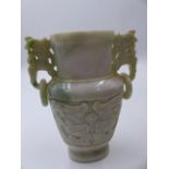 A CHINESE HARDSTONE TWO HANDLED VASE AND COVER WITH STAND. H.14cms. (boxed)