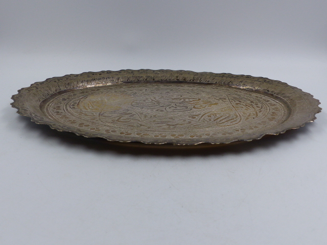 AN INDO PERSIAN WHITE METAL DECORATED TRAY. APPROXIMATE MEASURMENTS 33.5cms X 25.5cms.