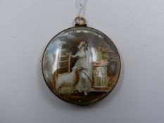 AN ANTIQUE FRENCH GOLD MOURNING PENDANT. A MINIATURE SCENE ADORNS THE FRONT, FINELY HAND PAINTED AND