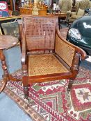 A 19th.C.MAHOGANY BERGERE LIBRARY ARMCHAIR.