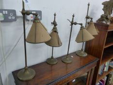 TWO PAIRS OF VINTAGE BRASS ADJUSTABLE ARTS AND CRAFTS STYLE TABLE LAMPS. LARGEST H.63cms.