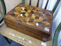 A GEORGIAN WALNUT AND PARQUETRY INLAID WORK BOX TOGETHER WITH A STATIONERY RACK, VARIOUS TEXTILES,