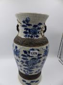 A CHINESE BLUE AND WHITE CRACKLE GLAZE TWIN HANDLE BALUSTER VASE WITH DRAGON DECORATION. IMPRESSED