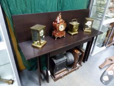 A PAIR OF HEALS BLACK ASH CONSOLE TABLES WITH FOLD OVER TOPS