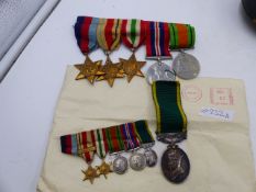 A WWII GROUP OF MEDALS WITH MINIATURES TO INCLUDE TERRITORIAL MEDAL TO BMBR R.D.R.ALLEN RA