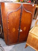 A LATE GEORGIAN MAHOGANY TWO DOOR CORNER CABINET WITH INLAID DECORATION. W.76 x H.116cms.