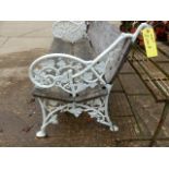 AN ANTIQUE GARDEN BENCH WITH CAST IRON ENDS OF ENTWINED IVY FORM.