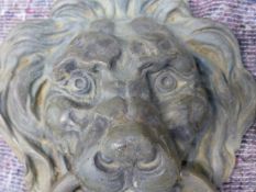 A LARGE BRONZE LION MASK DOOR KNOCKER. H.26.5cms.