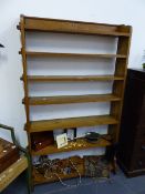 AN ANTIQUE ARTS AND CRAFTS OAK OPEN BOOKCASE. W.106 x H.170cms.