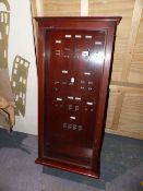 A VINTAGE MAHOGANY GLAZED CABINET, ORIGINALLY WITH DISPLAY FOR TELEPHONY EQUIPMENT.