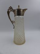 A HALLMARKED SILVER MOUNTED CUT GLASS CLARAT JUG, DATED 1928. APPROXIMATE HEIGHT 28.5cms.