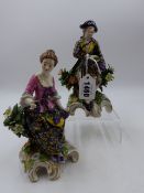 A PAIR OF LATE 19th.C. CONTINENTAL FIGURES OF THE GRAPE HARVESTERS ON ROCOCO STYLE BASES. H.17cms.