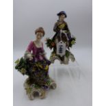 A PAIR OF LATE 19th.C. CONTINENTAL FIGURES OF THE GRAPE HARVESTERS ON ROCOCO STYLE BASES. H.17cms.