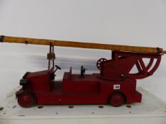 A SCRATCH BUILT MODEL OF A FIRE ENGINE.