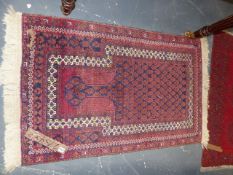 A BELOUCH PRAYER RUG 125 x 81cms AND TWO AFGHAN BOKHARA MATS. (3)