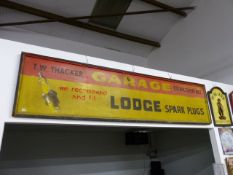 A LARGE GARAGE SIGN, T.W.THACKER, EST.1912, ADVERTISING LODGE SPARK PLUGS.