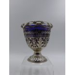 A SILVER HALLMARKED 18th CENTURY PIERCED PEDESTAL BASKET COMPLETE WITH BLUE GLASS LINER, DATED 1773.