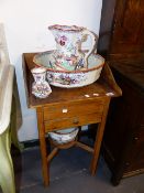 A VICTORIAN PINE SMALL WASHSTAND COMPLETE WITH A MASON'S IRONSTONE WASH JUG AND BOWL SET.