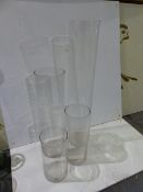 FOUR CYLINDER FORM CLEAR GLASS VASES OF GRADUATED SIZE. LARGEST H.