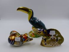 A ROYAL CROWN DERBY PAPERWEIGHT. GOLDEN RIO TOUCAN, 40/67 AND A CHAMELEON AND MANDARIN DUCK. (3)