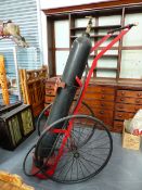 A RARE MORRIS MOTORS WORKSHOP FIRE EXTINGUISHER ON TWO WHEEL BARROW CARRIAGE.