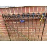 A WROUGHT IRON GARDEN GATE WITH ENAMEL No.8 PLAQUE.