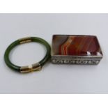 A WHITE METAL AND AGATE BOX FOR REPAIR TOGETHER WITH A JADEITE BANGLE.
