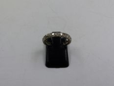 A PRECIOUS WHITE METAL DIAMOND FULL ETERNITY RING,FINGER SIZE H 1/2. APPROXIMATE WEIGHT 2.4grms.