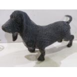 A LIFE SIZE WIREWORK GARDEN FIGURE OF A BASSETT HOUND. L.97cms.