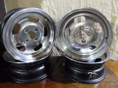 A GOOD SET OF FIVE 13" 1970/80'S RETRO ALLOY SLOT WHEELS BY WARWICK IN NEAR NEW CONDITION.